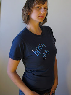 A portrait of Aramee Diethelm wearing a tshirt she silkscreened