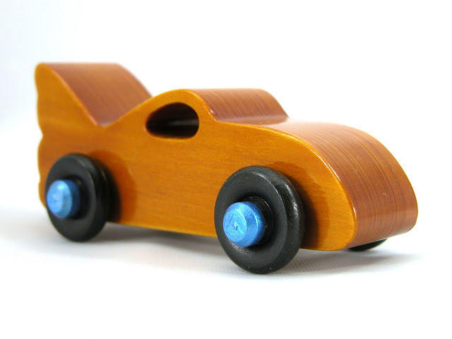 Handmade Wood Toy Car based on the Bat Car in the Play Pal Series, Amber Body, Metallic Blue Hubs, Black Wheels