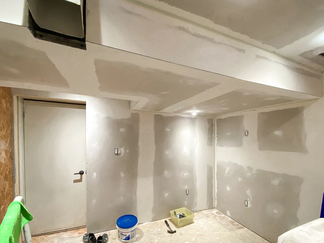 basement laundry room renovation, laundry room remodel, diy drywall installation