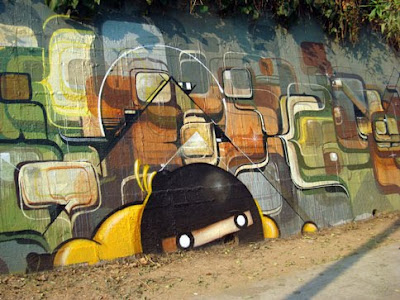 street art graffiti by Kofie Eye and Cache
