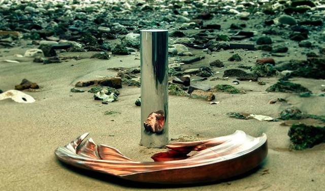 Anamorphic Sculptures Revealed in Cylindrical Reflections