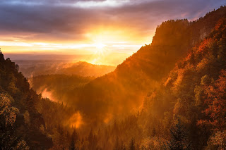 Sunset with mountains and trees