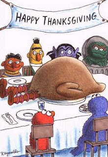 Sesame Street characters sitting around table with the Thanksgiving turkey that looks like it was Big Bird.