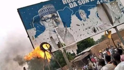 Protests Rock Kastina As Angry Youths Burn Down Buhari’s Billboard (Photos) 