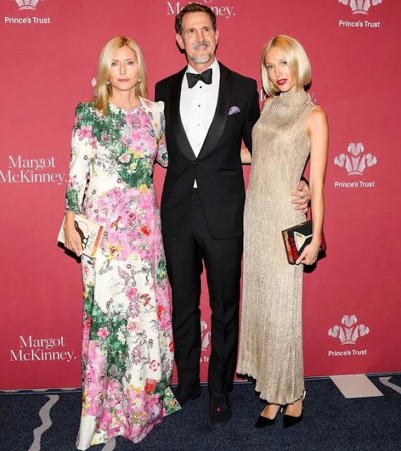 Princess Marie-Chantal wore a floral gown by Mary Katrantzou. Princess Maria-Olympia wore a lame turtleneck dress by Prada