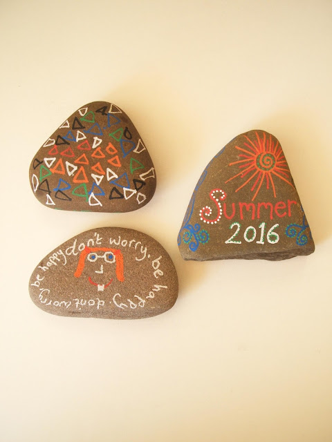 collection of pebbles we decorated with posca pens