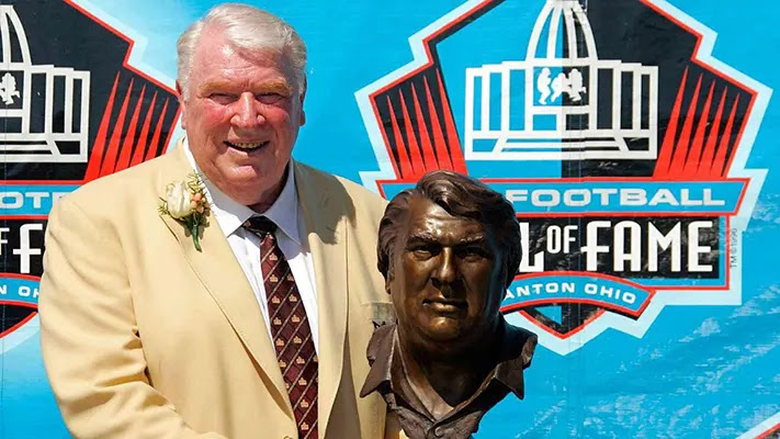 John Madden with his Sculpture in his hand