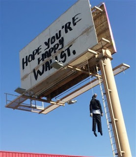 A mannequin dangling on a hangman's noose