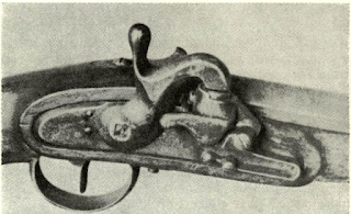 Detonator lock of Guiseppe Consol was modified by Austrian engineers and named after Austro-Hungarian Ordnance General Vincent Augustin. System is type 1840; is here shown fitted to smoothbore musket. Holes left in lock after side assembly is removed in converting to percussion give rise to supposition arm was “originally flintlock.” Belief is, M. Ancion & Co. converted 60,000 in Liege for Boker to sell to U.S.