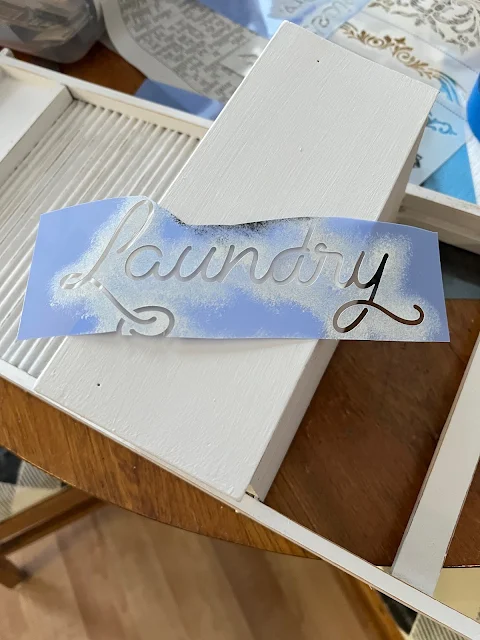 Photo of a scrap of a laundry stencil.