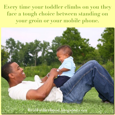 Every time your toddler climbs on you they face a tough choice between standing on your groin or your mobile phone