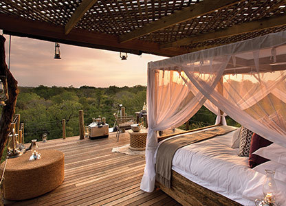  14 Crazy Hotels That Will Give You Serious Travel Goals - The Kingston Treehouse in Lion Sands, South Africa is basically a luxury treehouse, keeping guests away from wildlife while giving them spectacular views.