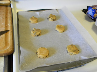Chocolate Chip Cookies, pre-baked on parchment paper