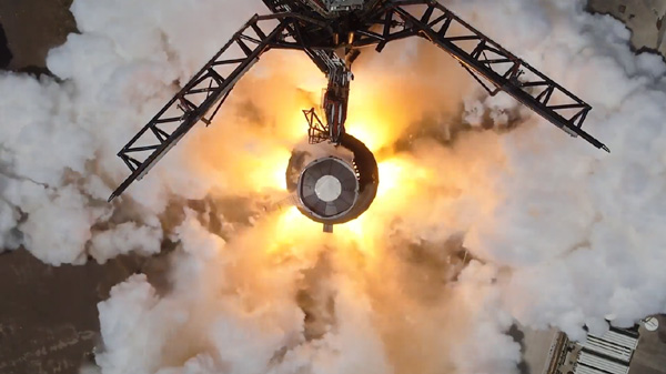 An overhead view of Booster 9 conducting a second static fire atop the Orbital Launch Mount at Starbase in Texas...on August 25, 2023.