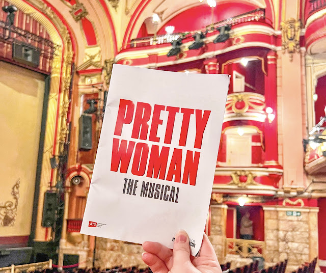 The Pretty Woman theatre programme with the red and gold Bristol Hippodrome theatre as the backdrop