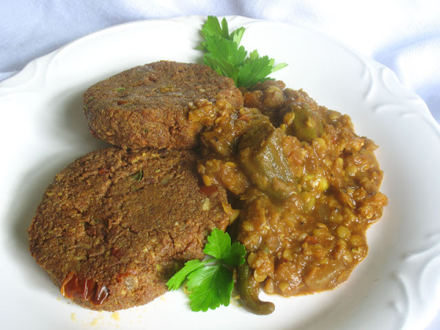 red lentil orka stew amongst teff cakes