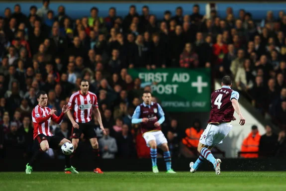 Aston Villa captain Ron Vlaar shoots and scores the opening goal against Sunderland