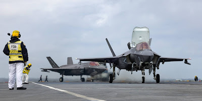 The Flight Deck Officer and Chief of the Flight Deck on HMS Queen Elizabeth during exercise Strike Warrior on the 15th of May 2021