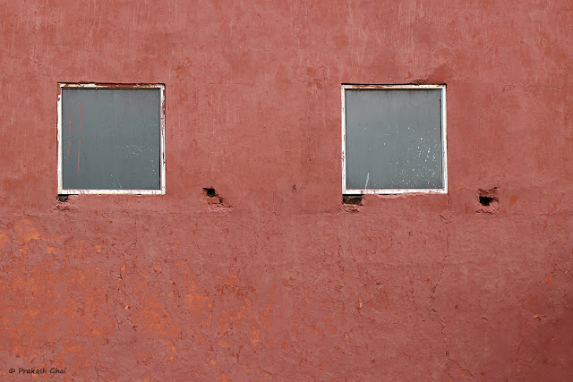 A Blog post on a Minimal Art Photograph of Two Squares on a Red Wall. 