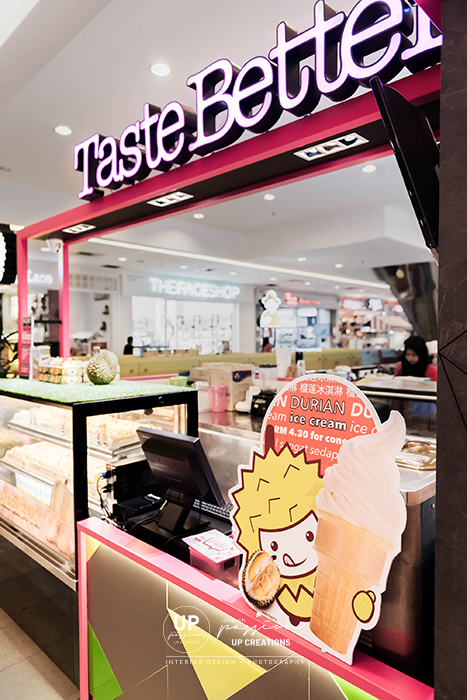 taste better empire subang kiosk with striking corporate pink color metal structure with lighted main signage