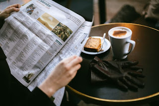 Reading Newspaper