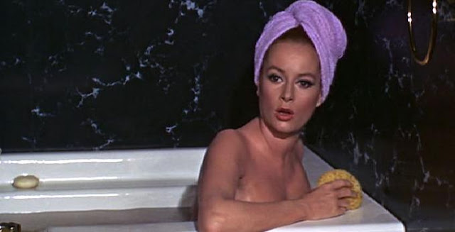 Here for no particular reason is a picture of the hot redhead from Thunderball in a bathtub. I think her name is Tunsa Redbush.