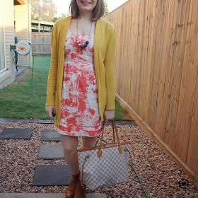 awayfromtheblue Instagram | orange printed sheath dress with mustard yellow cardigan colourful office outfit