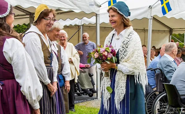 Queen Silvia celebrates the Day of the Ancients in Ekero. Swedish folk costumes and traditional clothing