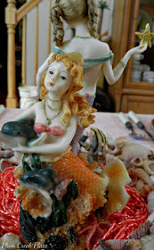 Plum Creek Place = Coral and pink Mermaid tablescape