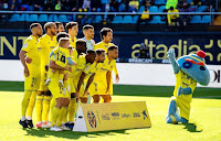 VILLARREAL C. F. Temporada 2021-22. Danjuma, Capoue, Raúl Albiol, Pau Torres, Gerónimo Rulli, Dani Parejo. Manu Trigueros, Pervis Estupiñán, Serge Aurier, Paco Alcacer, Francis Coquelin. VILLARREAL C. F. 1 GETAFE C. F. 0. Domingo 07/11/2021 14:00 horas. Campeonato de Liga de 1ª División, 13ª jornada. Villarreal, Castellón, estadio de La Cerámica: 13.504 espectadores. Árbitro: Jesús Gil Manzano, Extremadura. VAR: Xavier Estrada Fernández, Cataluña. Entrenadores: Villarreal: Unai Emery; Getafe: Quique Sánchez Flores. GOLES: 1-0: 6’, Manu Trigueros.