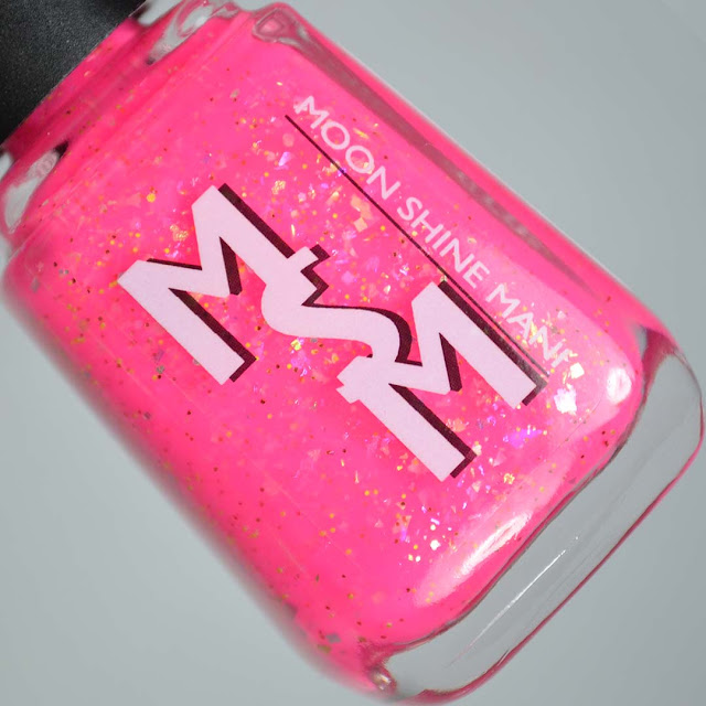 hot pink nail polish with flakies in a bottle