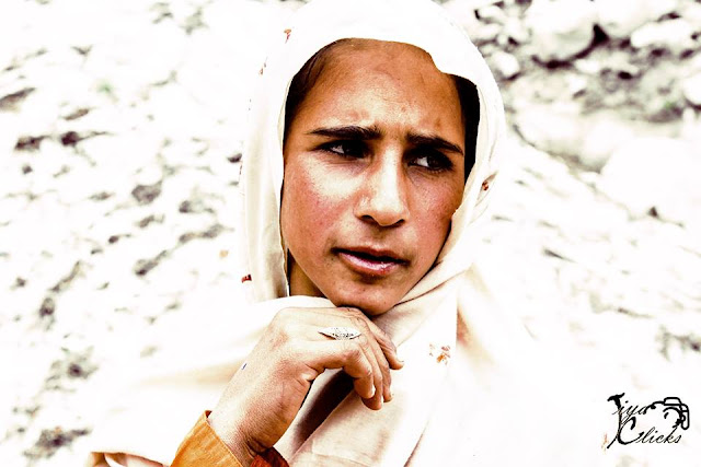 An Old Woman From The Rural Areas Of Pakistan Posing For The Camera