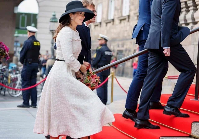 Crown Princess Mary wore an ivory tweed midi dress by Mark Kenly Domino Tan. Gianvito Rossi and Diane von Furstenberg