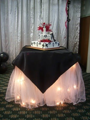 The Cake Table matches the Bridal Table The unironed backdrop belongs to 