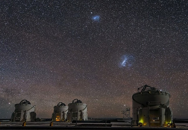 fotos con telescopios y en el cielo se va la gran nube de magallanes 