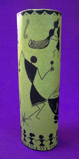 warli art on a vase. warli motifs in celebration mood