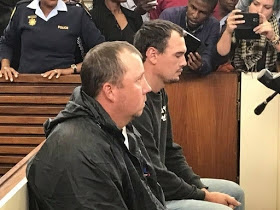 Two white South Africans arraigned in court for forcing black man into coffin (PHOTOs)