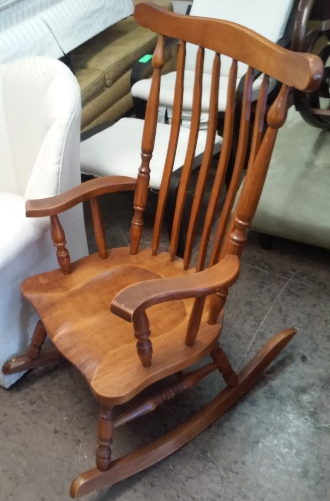 UHURU FURNITURE & COLLECTIBLES: SOLD Oversized Hardwood Rocking Chair - $75