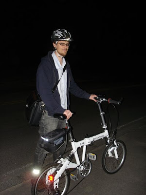 Man on a folding bike