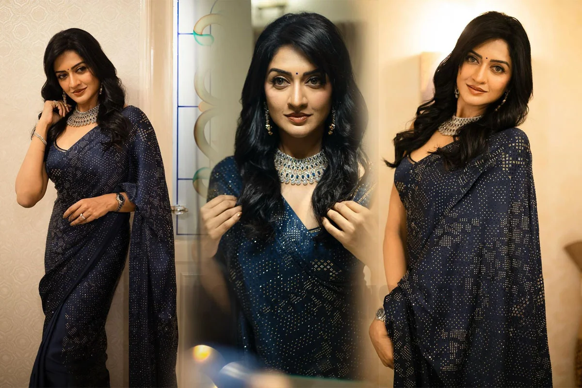 Actress Vimala raman stylish looks in blue saree photoshoot