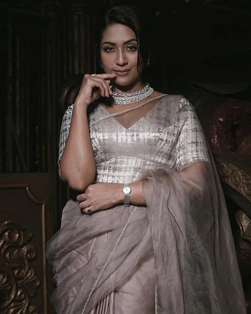 Navya Nair exudes elegance in her latest photoshoot, showcasing timeless beauty and style