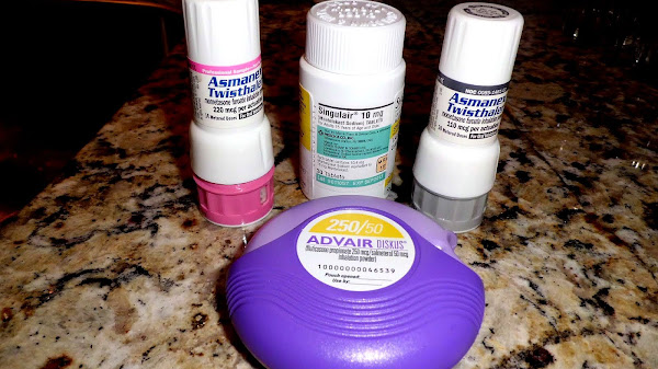 Round Purple Asthma Inhaler