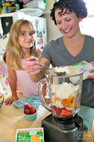 This Strawberry Papaya Tofu Smoothie is a thick & creamy blend of tofu, sweet strawberries, fresh papaya, frozen mango, & banana- a perfect quick & easy after school snack!