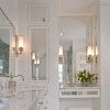 White Bathroom Cabinet Ideas : White Bathroom with Antiqued Mirrored Cabinets ... : This modern white bathroom includes a double wide mirror and double sink, creating beautiful clean lines.
