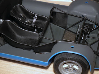 Seat & pedals fitted to floor of Porsche 910