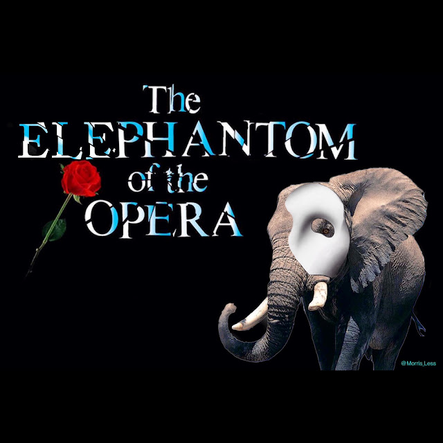 phantom of the opera pun - an elephant with the phantom of the opera face mask