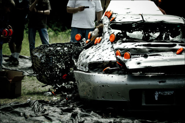 Porsche 911 Gets Shot up with Weapons