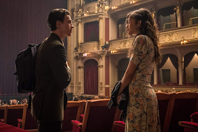 Spider-Man: Far from Home movie still where Peter Parker (Tom Holland) and MJ (Zendaya) meet up at an opera house on their summer school trip