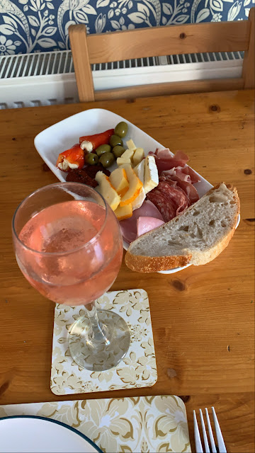 Nonna's Antipasti platter for 2 with a glass of rose wine