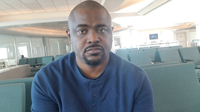 Guy at Airport with look of Disappointment about standby